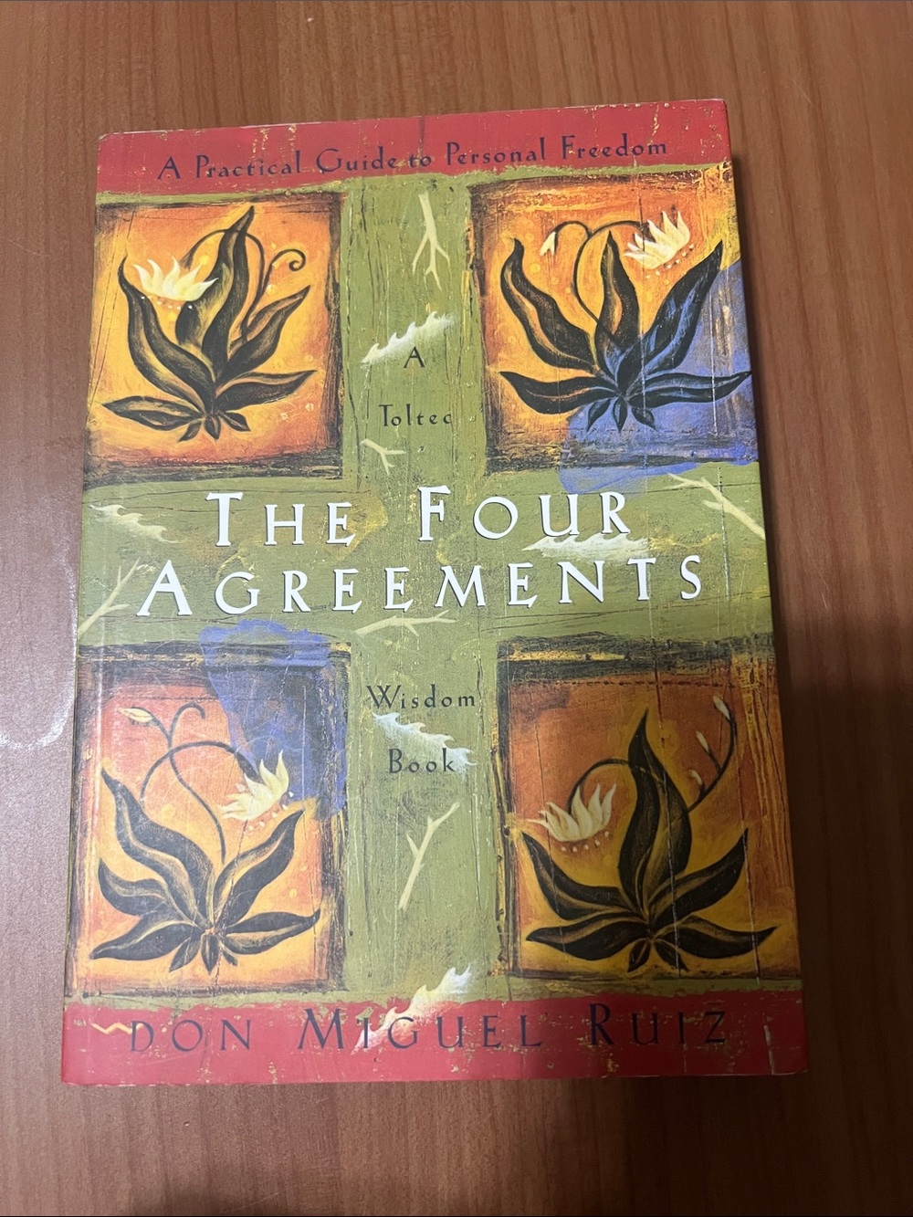 The Four Agreements by Don Miguel Ruiz - Multicolor Book Cover